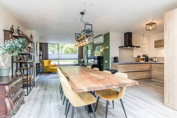 Foto - Verkocht: Ruime instapklare geschakelde 2 onder 1 kap woning voorzien van een goed isolatiepakket met aanbouw, bijkeuken, ruime tuin op zuiden (ca 131 m2) en garage gelegen in Kunrade.